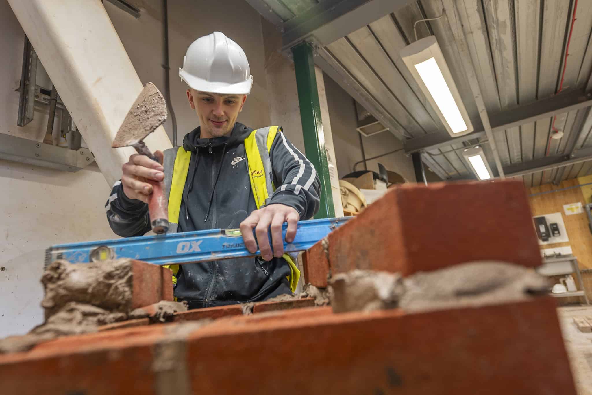 A construction student in the construction workshop at Dumfries and Galloway College