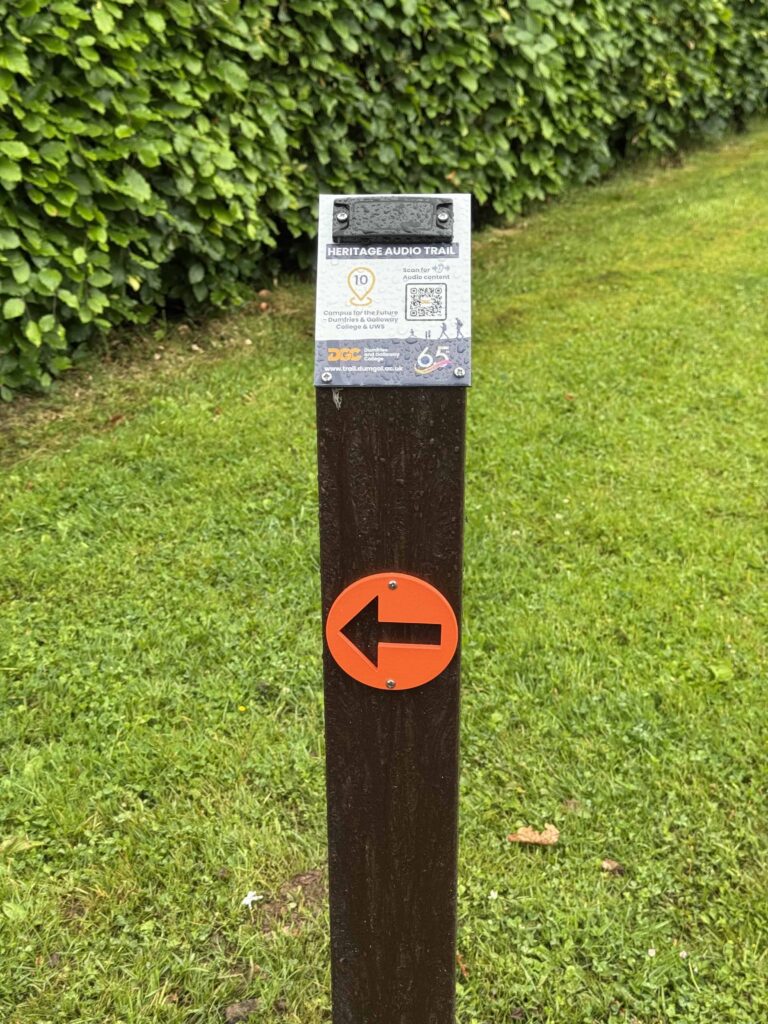 Waymarker 10 on the DGC Heritage Audio Trail at the top of the college car park near Dudgeon House.