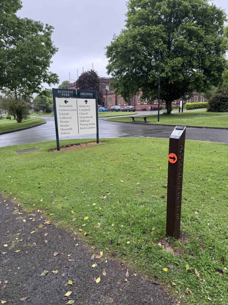 Waymarker 9 on the DGC Heritage Audio Trail close by the flag pole near Easterbrook Hall.