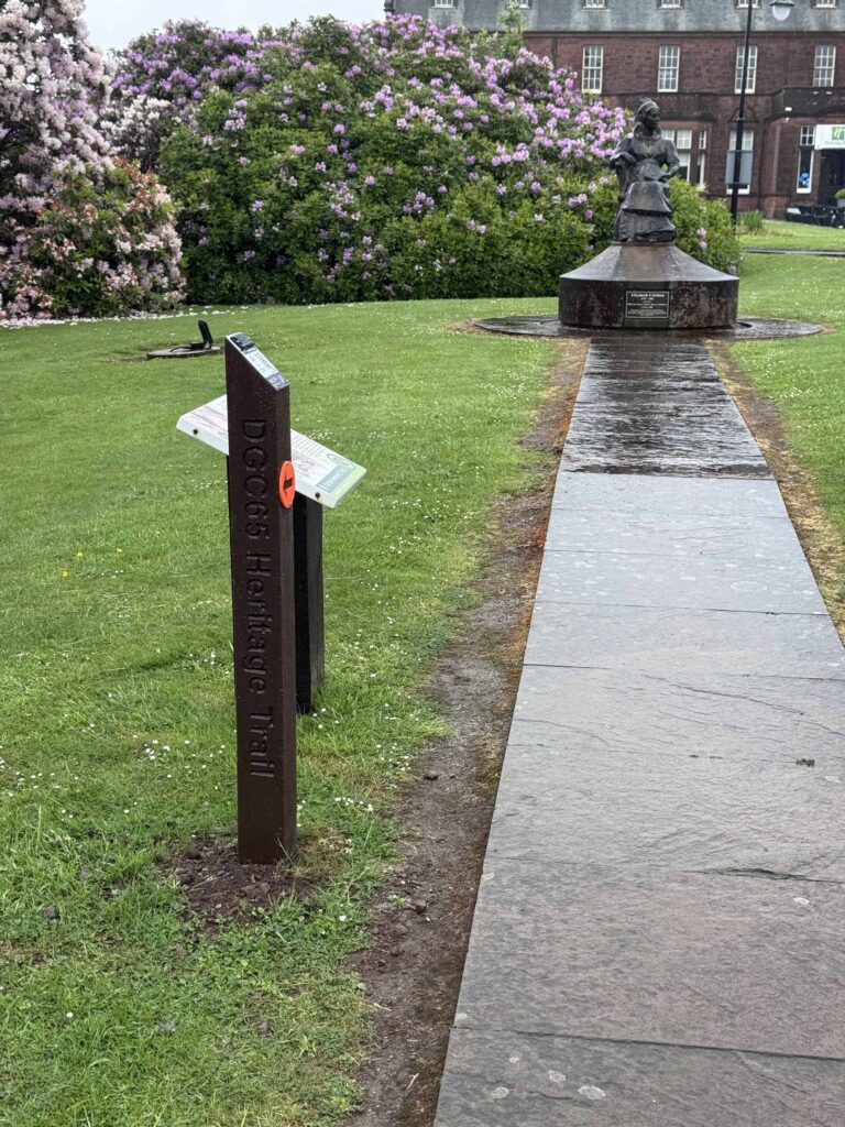 Waymarker 8 on the DGC Heritage Audio Trail at the junction from The Crichton Memorial Church near Easterbrook Hall heading towards the Holiday Inn